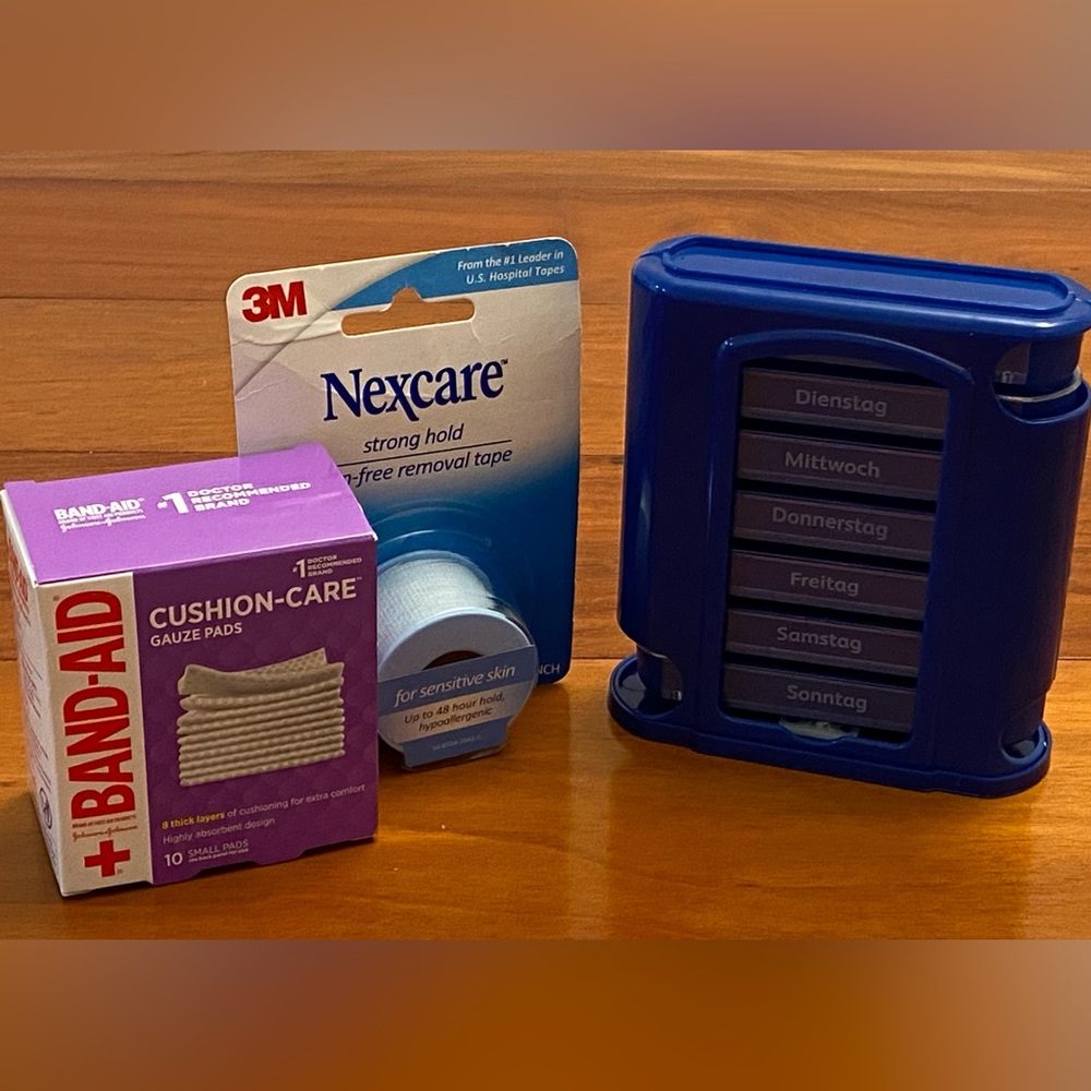 Pill box, gauze pads & paper tape